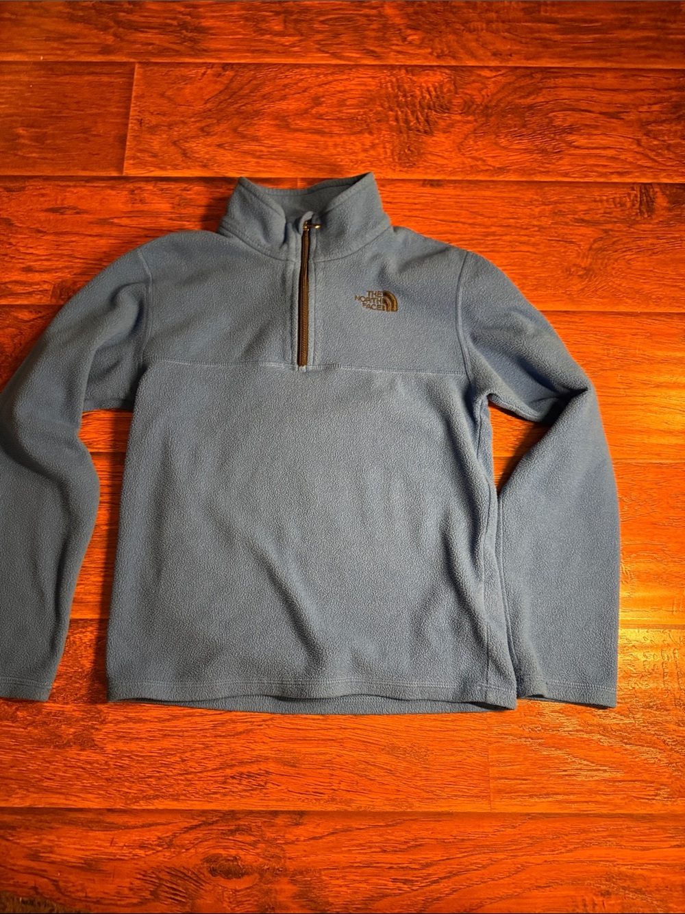 The North Face Light Blue Half-Zip Fleece Top. Your Med 10/12. Like new